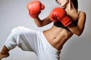 beautiful woman with the red boxing gloves, studio shot